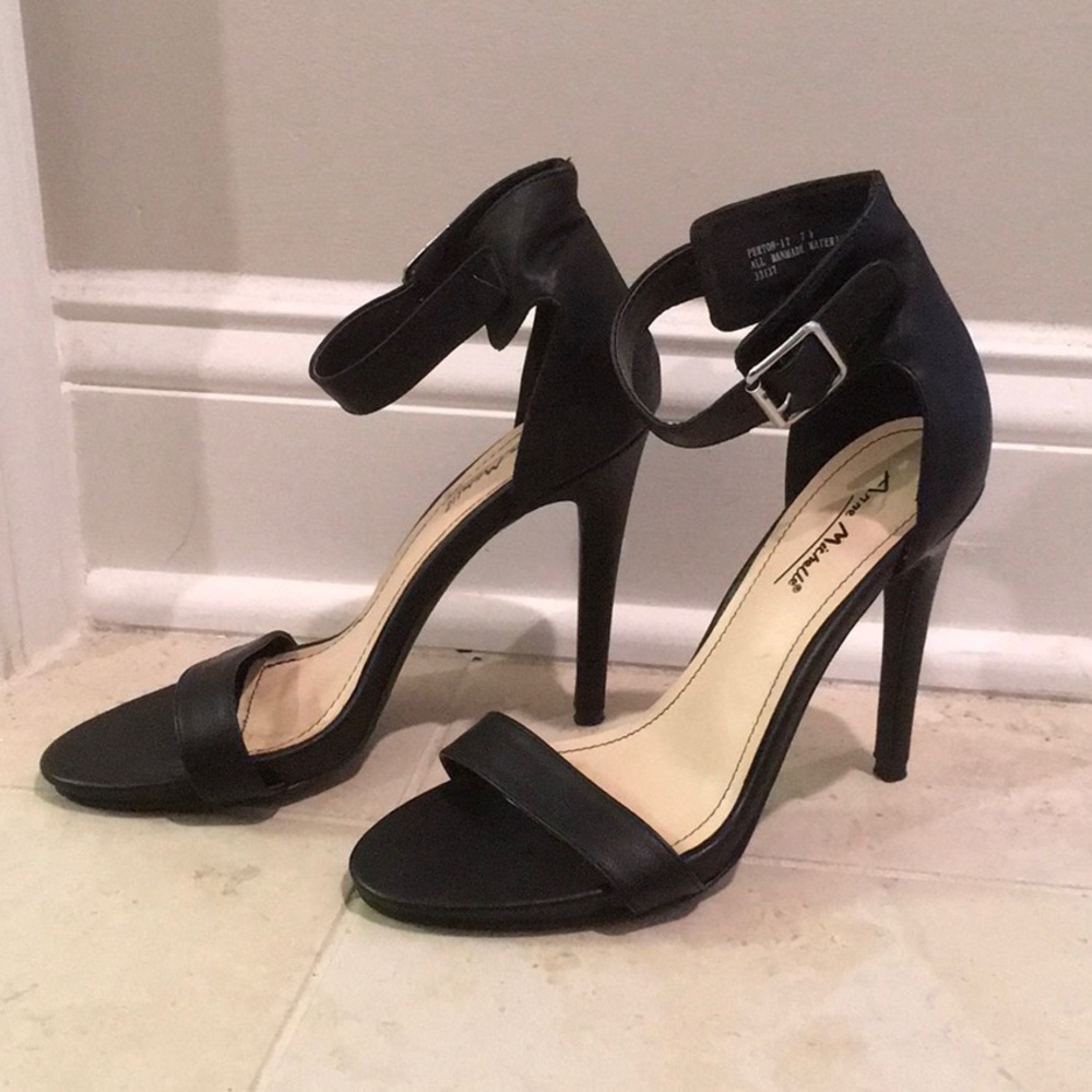 Black heels. All man made material. Anne Michelle